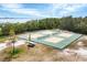 Outdoor pickleball courts with scenic waterfront views at 115 Burns Rd, Terra Ceia, FL 34250