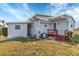 Home exterior with detached shed and red deck at 1204 43Rd E Ave, Ellenton, FL 34222