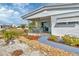 Landscaped walkway leading to the home's entrance at 1204 43Rd E Ave, Ellenton, FL 34222