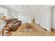 Living room featuring brown leather couches and a ceiling fan at 1204 43Rd E Ave, Ellenton, FL 34222