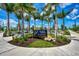 Welcoming entrance to community with landscaping and signage at 12563 Felice Dr, Venice, FL 34293