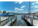 Calm marina with boats docked and a clear view at 12563 Felice Dr, Venice, FL 34293