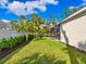 Expansive backyard with lush green grass, providing plenty of space for outdoor activities at 1519 Harbor Dr, Sarasota, FL 34239