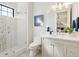 Stylish bathroom featuring a glass enclosed shower and neutral vanity with mirror at 1519 Harbor Dr, Sarasota, FL 34239