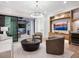 Inviting living room features an entertainment center, modern lighting, and seamless indoor-outdoor flow at 1519 Harbor Dr, Sarasota, FL 34239