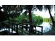 Wooden dock extending over calm river waters at 1925 146Th E Ter, Parrish, FL 34219