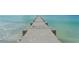 Long jetty extending into the ocean at 2295 Gulf Of Mexico Dr # 115S, Longboat Key, FL 34228