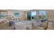 Living area showcasing water views and modern furnishings at 2295 Gulf Of Mexico Dr # 115S, Longboat Key, FL 34228