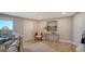 Condo living room featuring neutral decor and hardwood floors at 2295 Gulf Of Mexico Dr # 115S, Longboat Key, FL 34228