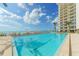 Relaxing pool area with ocean views at 2295 Gulf Of Mexico Dr # 115S, Longboat Key, FL 34228