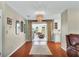 Bright dining room with hardwood floors and access to the sunroom and kitchen at 2503 Bispham Rd, Sarasota, FL 34231