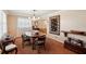 Formal dining room with wooden table and dark brown carpet at 2519 17Th W Ave, Bradenton, FL 34205