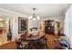 Spacious dining room featuring a wooden table and decorative wall art at 2519 17Th W Ave, Bradenton, FL 34205