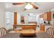 Bright kitchen with wood cabinets, island, and dining area at 2519 17Th W Ave, Bradenton, FL 34205