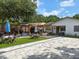 Spacious backyard with pergola, patio, and seating area at 2606 19Th St, Sarasota, FL 34234