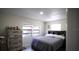 Comfortable bedroom with a dresser and queen-size bed at 2606 19Th St, Sarasota, FL 34234