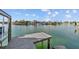 Wooden deck boat dock offering scenic waterfront views at 2762 W Vina Del Mar Blvd, St Pete Beach, FL 33706