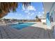 Inviting pool area with patio and water views at 2762 W Vina Del Mar Blvd, St Pete Beach, FL 33706