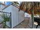 Exterior shed with white metal siding at 2762 W Vina Del Mar Blvd, St Pete Beach, FL 33706