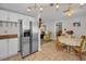 Kitchen with stainless steel appliances and dining area at 3055 Holiday Lake Dr, Holiday, FL 34691