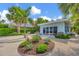 Inviting backyard oasis with lush landscaping and ocean views at 325 Casey Key Rd, Nokomis, FL 34275