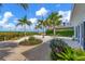 Landscaped backyard with ocean views and ample space for relaxation at 325 Casey Key Rd, Nokomis, FL 34275