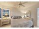 Cozy bedroom with a comfortable bed and plenty of natural light at 325 Casey Key Rd, Nokomis, FL 34275