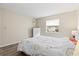 Simple bedroom with a queen-size bed and dresser at 3275 Beneva Rd # 104, Sarasota, FL 34232