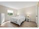 Comfortable bedroom with a queen-size bed and dresser at 3275 Beneva Rd # 104, Sarasota, FL 34232