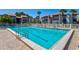 Inviting community swimming pool with ample deck space at 3275 Beneva Rd # 104, Sarasota, FL 34232