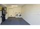 Garage with washer, dryer, and extra storage space at 3401 Rochelle Ct # 131, Clearwater, FL 33761