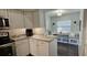 Updated kitchen with breakfast nook and stylish backsplash at 3401 Rochelle Ct # 131, Clearwater, FL 33761