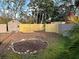 Large backyard with shed, wood chips, and a garden area at 4019 Worcester Rd, Sarasota, FL 34231