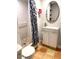 Clean bathroom with walk-in shower, pedestal sink, and tiled floor at 4019 Worcester Rd, Sarasota, FL 34231