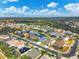 Aerial view of neighborhood with lake at 4360 85Th Avenue E Cir, Parrish, FL 34219