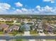 Aerial view of neighborhood with lake at 4360 85Th Avenue E Cir, Parrish, FL 34219