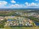 Aerial view of neighborhood with lake at 4360 85Th Avenue E Cir, Parrish, FL 34219