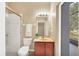 Clean bathroom with shower, toilet, and vanity at 4360 85Th Avenue E Cir, Parrish, FL 34219