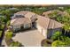 Luxury home with tile roof, large driveway & pool at 45 Grand Palms Blvd, Englewood, FL 34223