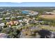 Wide view of community, showcasing property location and surrounding landscape at 45 Grand Palms Blvd, Englewood, FL 34223