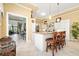 Kitchen with breakfast bar and view to Gathering room at 45 Grand Palms Blvd, Englewood, FL 34223