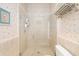 Large walk-in shower with glass enclosure at 45 Grand Palms Blvd, Englewood, FL 34223