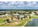 Community pool and park with a large lake nearby at 4512 Renwick Dr, Parrish, FL 34219