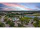 Community pool, playground, and open green spaces with lake views at 4512 Renwick Dr, Parrish, FL 34219