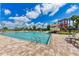 Community pool with a large waterslide at 4512 Renwick Dr, Parrish, FL 34219