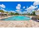 Large community swimming pool with a waterslide at 4512 Renwick Dr, Parrish, FL 34219