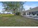 Large backyard with a patio, providing ample outdoor space at 4728 Sand Trap Street E Cir, Bradenton, FL 34203