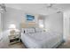 Bright bedroom with a queen-size bed and coastal decor at 4728 Sand Trap Street E Cir, Bradenton, FL 34203