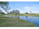 Serene pond and golf course view from the property at 4728 Sand Trap Street E Cir, Bradenton, FL 34203