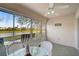 Bright sunroom overlooking the golf course at 4728 Sand Trap Street E Cir, Bradenton, FL 34203